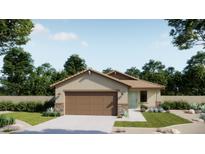 Charming single-story home with a two-car garage, lush landscaping, and inviting curb appeal at 32002 N Pony Express Rd, San Tan Valley, AZ 85143