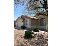 Charming single-story home with desert landscaping and a two-car garage, blending comfort with curb appeal at 35414 N 32Nd Dr, Phoenix, AZ 85086