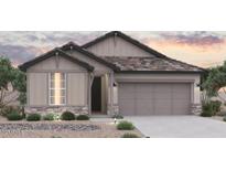 Charming single-story home featuring stone accents, a two-car garage, and desert landscaping at 40000 W Bunker Dr, Maricopa, AZ 85138