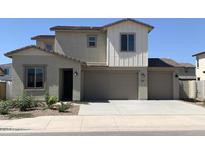 Charming two-story home with a three car garage and manicured landscaping at 5004 W Brown St, Glendale, AZ 85302
