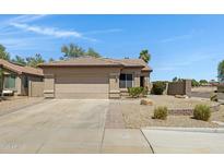 Charming single-story home with desert landscaping and a two-car garage in a desirable neighborhood at 1821 S Navajo Way, Chandler, AZ 85286