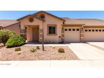 Charming home featuring desert landscaping, a tile roof, and an attached two-car garage at 2250 E Deer Valley Rd # 96, Phoenix, AZ 85024
