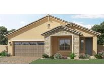 Charming single-story home with stone accents, a two-car garage, and a well-maintained front yard at 25188 N 174Th Ave, Surprise, AZ 85387