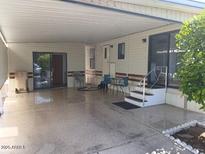 This patio features a covered area with outdoor seating, offering a relaxing space to enjoy the outdoors at 2656 N 56Th St # C160, Mesa, AZ 85215