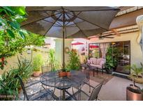 Relaxing outdoor patio with comfortable seating and lush greenery, perfect for entertaining at 7635 S Taylor Dr, Tempe, AZ 85284