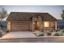 Charming single-story home with a stone facade, tile roof, and well-manicured landscaping at 26651 W Kimberly Way, Buckeye, AZ 85396