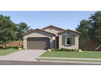 Charming single-story home with a neutral color palette, well-maintained lawn and desert landscaping at 36550 W Maddaloni Ave, Maricopa, AZ 85138