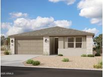 Charming single-story home featuring a neutral color palette, an attached two-car garage, and low maintenance landscaping at 5520 W Piedmont Rd, Laveen, AZ 85339