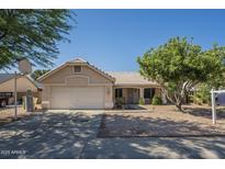 Charming single-story home showcasing a well-maintained front yard, desert landscaping, and a two-car garage at 7930 W Colter St, Glendale, AZ 85303