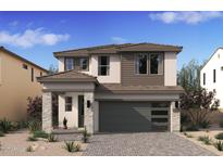 Charming two-story home with stone accents, modern garage door, and desert landscaping at 8041 W Griswold Rd, Peoria, AZ 85345