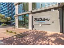Exterior view of the Edison Midtown building entrance with modern architecture and landscaping at 3131 N Central Ave # 3004, Phoenix, AZ 85012