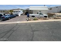Charming mobile home with ample parking and well-maintained landscaping at 13205 N 18Th Pl, Phoenix, AZ 85022