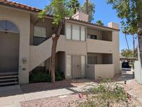 Charming two-story condo features a private entrance and well-maintained landscaping at 1820 E Morten Ave # 119, Phoenix, AZ 85020