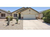 Charming single-story home with a two-car garage and low-maintenance desert landscaping at 3011 W Salter Dr, Phoenix, AZ 85027