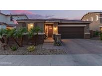 Charming single-story home featuring a well-kept yard, private front gate, and a two-car garage at 17866 W Lilac St, Goodyear, AZ 85338