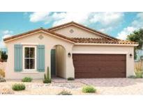 Charming single-story home with a tile roof, light stucco, a two-car garage, and desert landscaping at 40000 W Anne Ln, Maricopa, AZ 85138