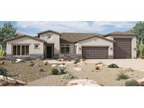 Stunning single-story home featuring a three-car garage and desert landscaping at 18130 E Silver Creek Ln, Queen Creek, AZ 85142