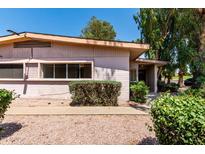 A charming single-story home featuring a well-maintained landscape and quaint entrance at 725 S Power Rd # 101, Mesa, AZ 85206