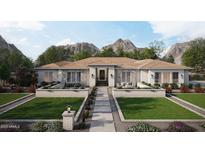 Stunning single-story home with mountain views, beautiful desert landscaping, and charming walkway at 1897 E Long Rifle Rd, Phoenix, AZ 85086