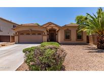 Charming single-story home with manicured landscaping and a welcoming front entrance in a well-kept neighborhood at 7169 W Lamar Rd, Glendale, AZ 85303