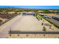 Expansive aerial view showcasing the property's large lot with desert landscaping and detached garage at 38415 N 25Th Ave, Phoenix, AZ 85086