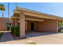 Charming single-story home featuring a private carport and well-maintained landscaping at 611 E Colgate Dr, Tempe, AZ 85283