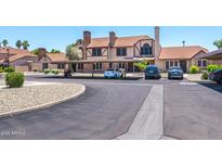 A charming condo community features covered parking and well-maintained landscaping at 8111 W Wacker Rd # 94, Peoria, AZ 85381