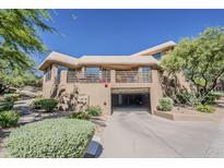 Stunning Southwestern-style home with a balcony and covered parking at 10222 E Southwind Ln # 1018, Scottsdale, AZ 85262