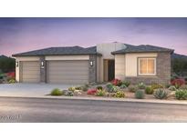 Stylish single-story home featuring a neutral color palette, desert landscaping, and a spacious two-car garage at 24726 N 169Th Ave, Surprise, AZ 85387