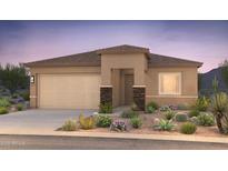 Charming single-story home featuring desert landscaping, stone accents, and a two-car garage at 18164 E Tiffany Dr, Queen Creek, AZ 85142
