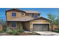Charming two-story home featuring a desert landscape and a two-car garage at 19015 W Rose Ln, Waddell, AZ 85355