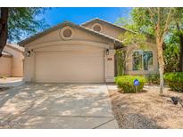 Charming single-story home featuring a two-car garage and low maintenance landscaping at 20044 N 30Th Pl, Phoenix, AZ 85050