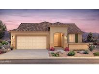 Charming single-story home with a desert landscape, two car garage, and a tile roof at 7661 W Meadowlark Way, Florence, AZ 85132