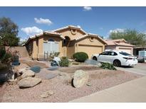 Charming single-Gathering home with desert landscaping and a two-car garage at 16251 N 91St Dr, Peoria, AZ 85382