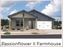 Charming single-story home with neutral colors, attached two-car garage and easy-to-maintain front yard at 36859 W Santa Maria St, Maricopa, AZ 85138