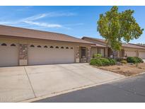 Charming single-story home featuring a three-car garage and stone accents at 11360 E Keats Ave # 20, Mesa, AZ 85209