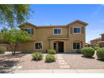 Charming two-story home featuring well-kept landscaping and classic architecture in a peaceful residential setting at 21813 N 40Th Way, Phoenix, AZ 85050