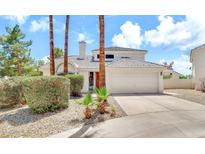 Charming home featuring manicured landscaping, a two-car garage, and a welcoming front entrance at 3389 W Barcelona Dr, Chandler, AZ 85226