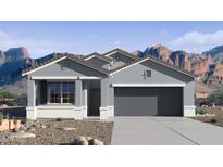 Charming single-story home with neutral paint, a two-car garage and mountain views at 22680 N Lynn St, Maricopa, AZ 85138