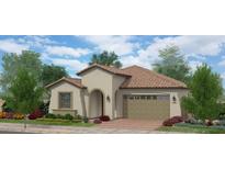 Charming single-story home featuring a tile roof, arched entryway, and well-maintained landscaping at 15660 W Pershing St, Surprise, AZ 85379