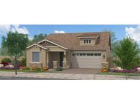Charming single Gathering home features stone accents, lush landscaping, and a two car garage at 15668 W Pershing St, Surprise, AZ 85379