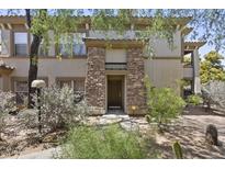 Charming home featuring a stone pillar entrance and well-maintained desert landscaping at 19700 N 76Th St # 1103, Scottsdale, AZ 85255