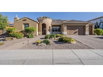 Charming single-story home with a well-manicured yard and a two-car garage at 3925 E Elmwood St, Mesa, AZ 85205