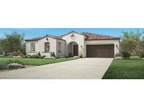 Stunning single-story home featuring stucco siding, red tile roof, two-car garage, and arched entryway at 3390 W Sunstone Dr, San Tan Valley, AZ 85144