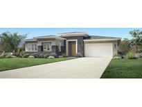 Modern single-story home featuring a two-car garage, manicured lawn and elegant landscaping at 3419 W Sunstone Dr, San Tan Valley, AZ 85144