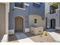 Charming townhome exterior featuring a private entrance and a well-maintained walkway at 280 S Evergreen Rd # 1296, Tempe, AZ 85288