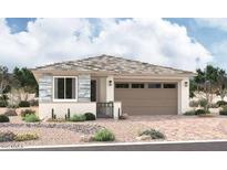 Charming single-story home featuring stone accents, desert landscaping, and a two-car garage at 15814 W Vogel Ave, Goodyear, AZ 85338