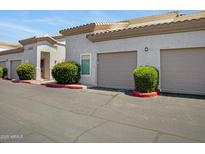 Charming condo featuring a two-car garage and well-maintained landscaping at 3236 E Chandler Blvd # 2018, Phoenix, AZ 85048