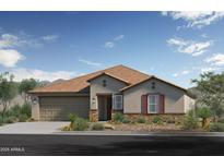Charming single-story home features a neutral color palette, stone accents, and a well-manicured front yard at 17204 W Blue Sky Dr, Surprise, AZ 85387