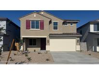 Inviting two-story home with a spacious two-car garage and low maintenance landscaping at 22863 N 183Rd Dr, Surprise, AZ 85387